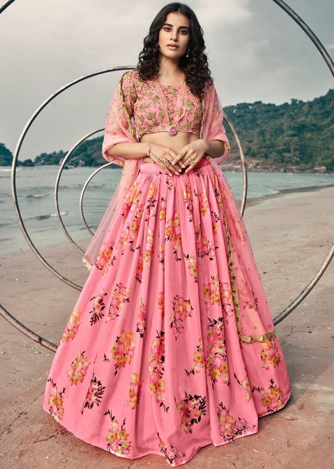image of rose-coloured lehenga with floral motifs